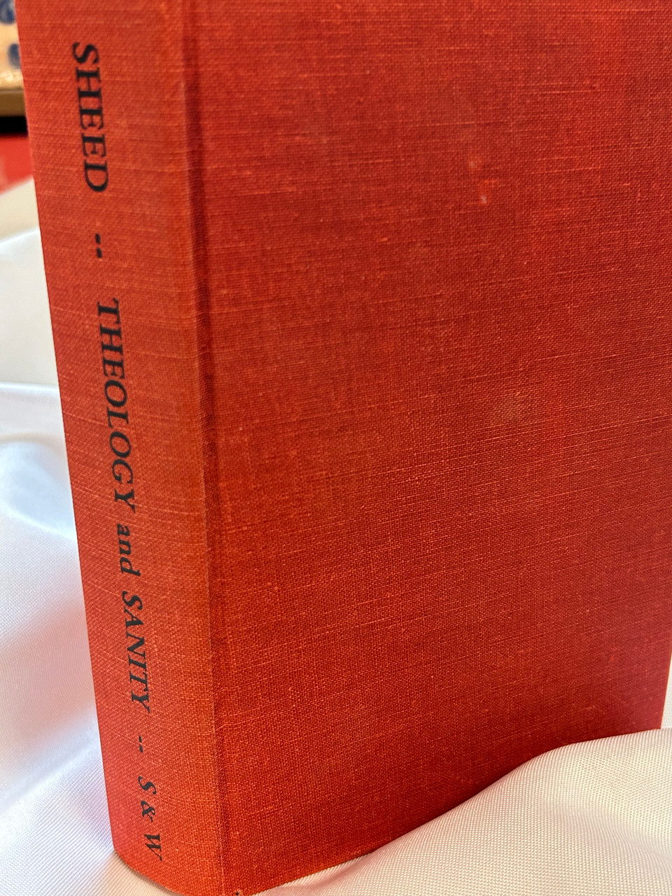 Vatican II issued an urgent call for the laity to take a more active role in the life of the Church. What should the life of the Christian believer be like? How are average lay Christians called to help save the world? How does theology fit into the picture?

One of Frank Sheed's most popular books, this ideal volume for the layman shows the practical aspects of theology in the life of a Christian believer. Logic, clarity, and simplicity permeate this eminently readable book. Drawing from his fifty years of street-corner preaching, as well as his long career as an author, lecturer and publisher, Sheed understands and communicates better than anyone the importance of theology and its relationship to living sanely in today's world. A brilliant synthesis of the Catholic view of life.

Used in good condition, dust jacket is missing, cover has minor wear at the foot of the spine. Contains only minor marking.