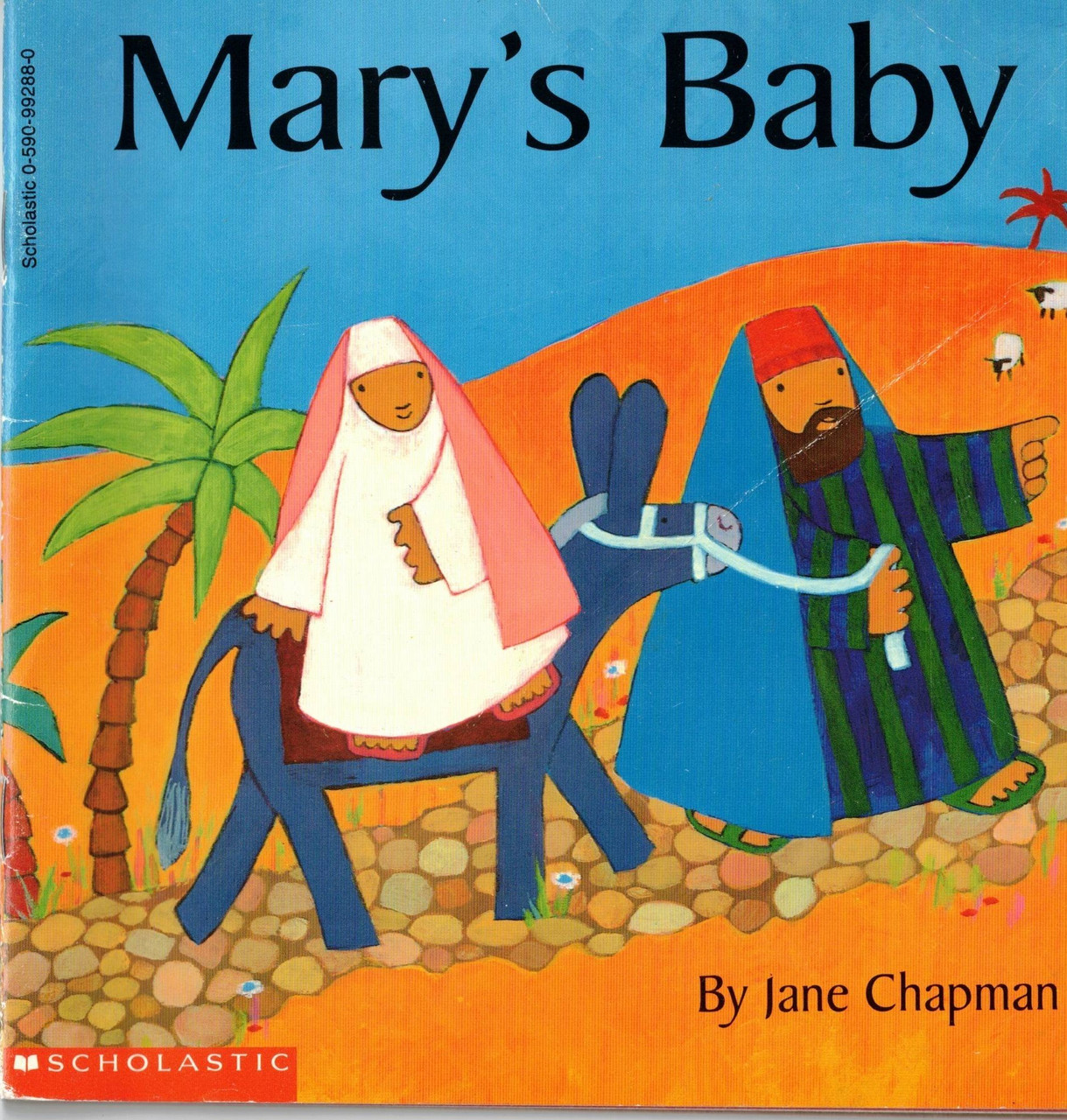 Mary's Baby by Jane Chapman - Children's book.  This is a used book that is a little rough around the edges and has beautiful pictures about Mary, Joseph and baby Jesus.