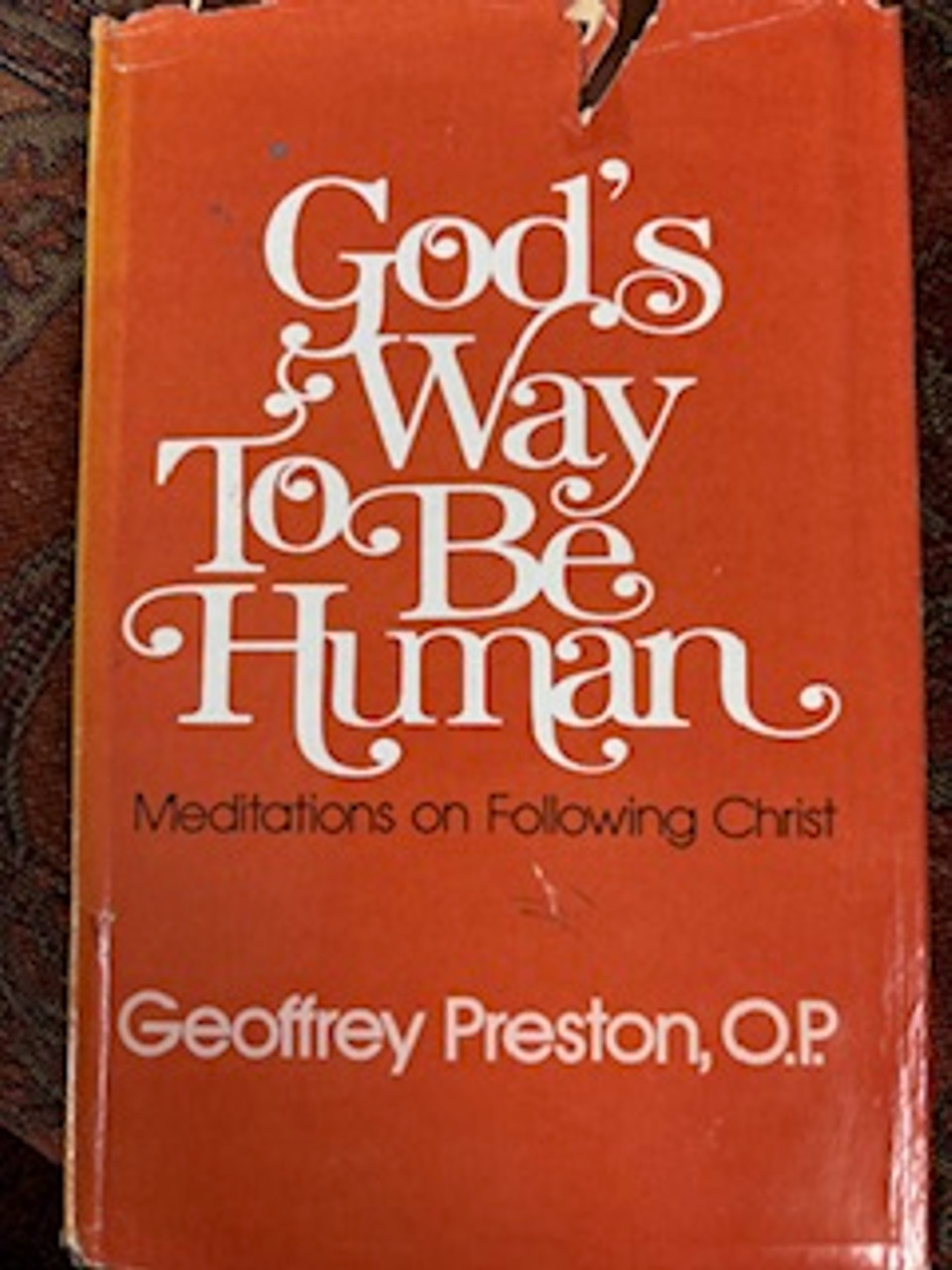 God's Way To Be Human - Meditations on Following Christ by Geoffrey Preston, O.P. - This is a used book with a tear on the cover, frayed edges and slight stains.  It's meditations on following Jesus and what it means for us Christians to be followers.