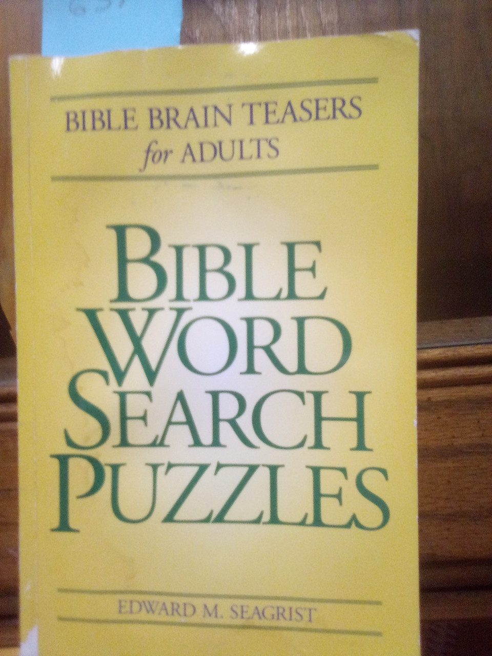 BIBLE WORD SEARCH PUZZLES - BRAIN TEASERS FOR ADULTS. - THIS IS A USED BOOK IN OKAY CONDITION WITH A LITTLE STAINED COVER - INCREASE YOUR KNOWLEDGE OF THE BIBLE, PEOPLE, PLACES AND EVENTS.