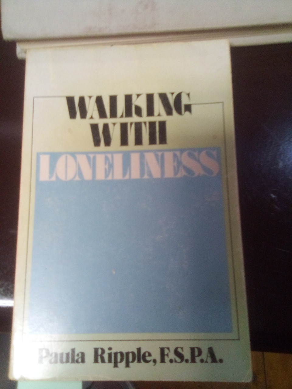 WALKING WITH LONELINESS BY PAULA RIPPLE, F.S.P.A. -  
THIS IS A USED BOOK IN OKAY CONDITION WITH STAINED PAGES – Loneliness is a "demanding and ever-present companion."  We all experience it.  The popular view of loneliness seems limited to one of fear an hesitation.  Sister Paula brings a message of Hope. WALKING WITH LONELINESS BY PAULA RIPPLE, F.S.P.A. -  
THIS IS A USED BOOK IN OKAY CONDITION WITH STAINED PAGES – Loneliness is a "demanding and ever-present companion."  We all experience it.  The popular view of loneliness seems limited to one of fear an hesitation.  Sister Paula brings a message of Hope.