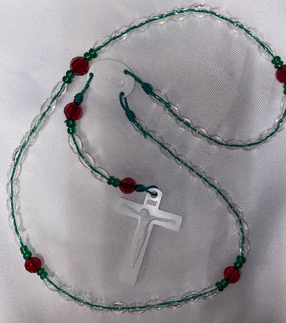 Red/Clear Bead Plastic Rosary on Green Cord