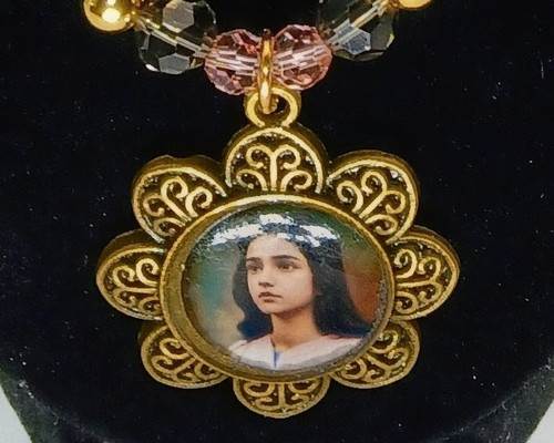 Unique bronze flower pendant of Saint Maria Goretti on Crystal Necklace