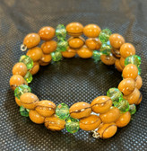 Olive wood bracelet 7mm beads, green crystal beads with a four way crucifix (made by Christians in the Holy Land)