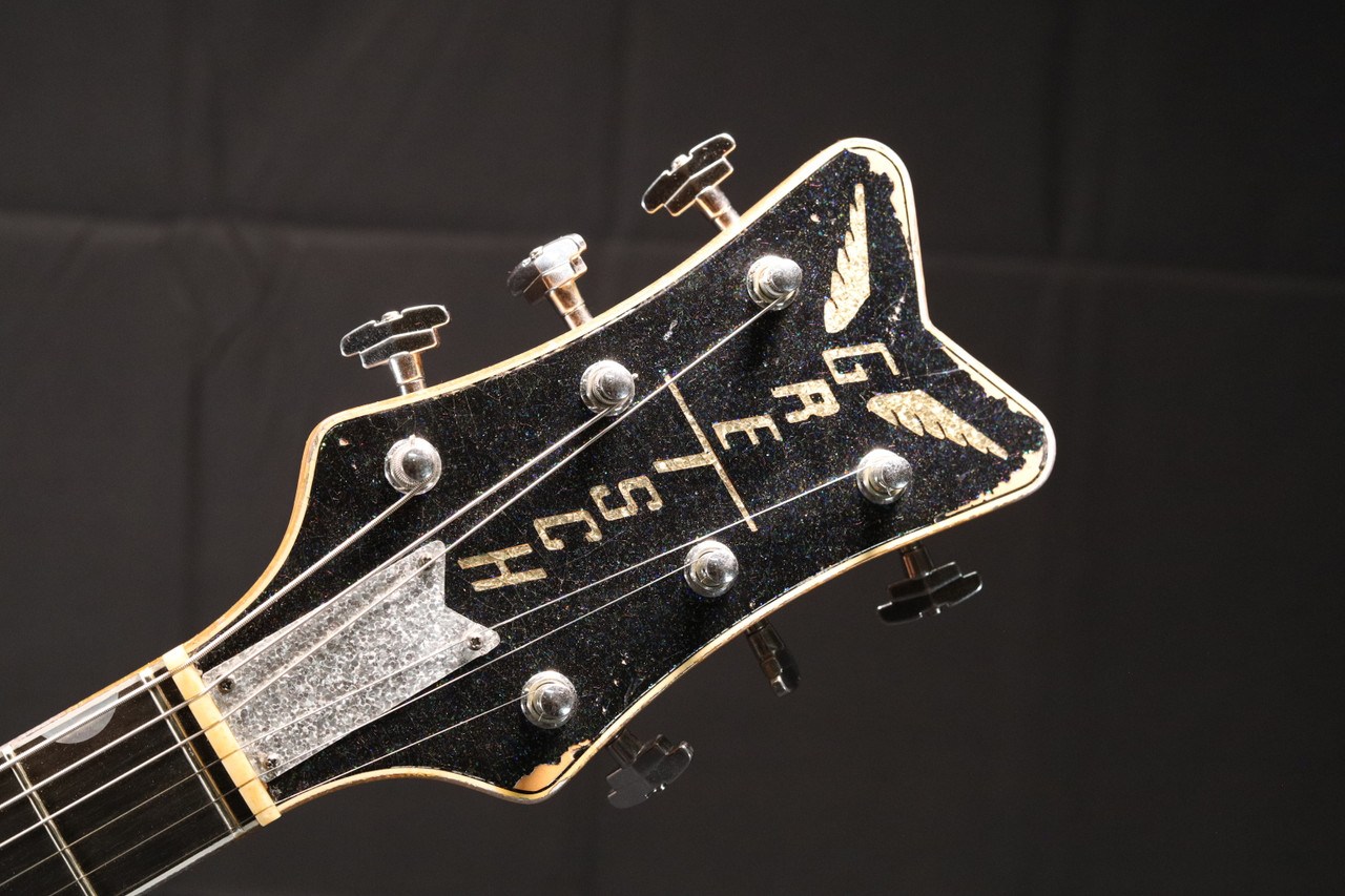 Gretsch Masterbuilt G6134-62 Black Holoflake over Pink Paisley
