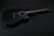 Martin Guitar X Series OMC-X1E Acoustic-Electric Guitar with Gig Bag, Black High-Pressure Laminate, 000-14 Fret, Performing Artist Neck Shape 337