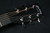 Martin Guitar X Series OMC-X1E Acoustic-Electric Guitar with Gig Bag, Black High-Pressure Laminate, 000-14 Fret, Performing Artist Neck Shape - 332