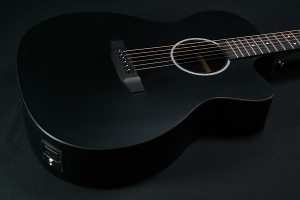 Martin Guitar X Series OMC-X1E Acoustic-Electric Guitar with Gig Bag, Black High-Pressure Laminate, 000-14 Fret, Performing Artist Neck Shape - 332