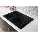 Whirlpool® 30-inch Electric Ceramic Glass Cooktop with Two Dual Radiant Elements WCE77US0HB