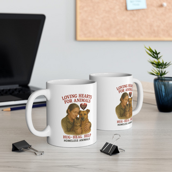 "Hug Heal Help Rescue mug supporting animal rescue awareness with every sip"