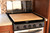Camco Camper/RV Silent Top Stovetop Cover — Protects Stoves & Expands Counter Space — Natural Bamboo with Non-Slip Rubber Feet — Fits Most 3 or 4 Burner RV Stoves — 19 1/2" x 17" x 3/4" 43571