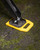 Camco RV Stabilizer Jack Pads — 6 3/16" x 6 3/16" Support Area — Resin Pads Keep Jacks from Sinking into the Ground — Interlocking Design with Handy Storage Strap — 4-Pack — Yellow — Made in the USA 44595