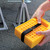 Camco RV Stabilizer Jack Pads — 6 3/16" x 6 3/16" Support Area — Resin Pads Keep Jacks from Sinking into the Ground — Interlocking Design with Handy Storage Strap — 4-Pack — Yellow — Made in the USA 44595