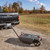 Camco Rhino Camper/RV Portable Waste Tank – 36-Gallon – Features Steerable No-Flat Front Wheels & Built-In Gate Valve – Includes Removable 24" Tow Bar, 3' RV Sewer Hose, & More RV Accessories 39007