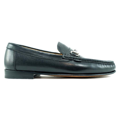 Side profile of black sheepskin bit loafer showing snaffle hardware and moc-toe stitching