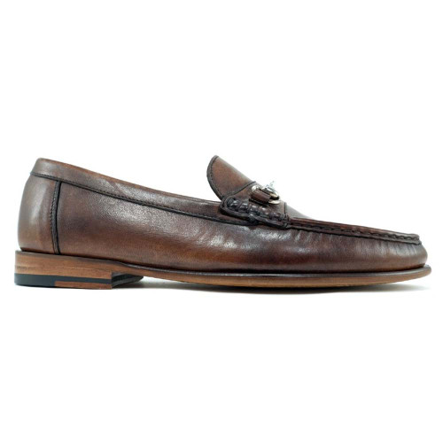 Side profile of brown sheepskin bit loafer showing snaffle hardware and moc-toe stitching