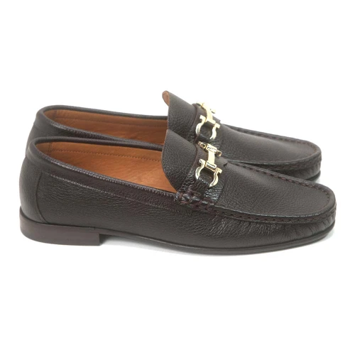Side profile of brown leather bit loafer showing silver-toned horsebit hardware detail