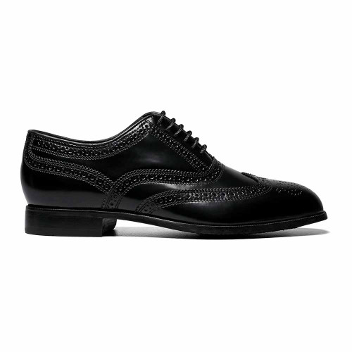 Side profile of the Florsheim Lexington black leather wingtip oxford showing full brogue detailing