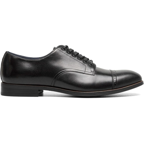 Side profile of the Stacy Adams William Cap Toe Oxford in Black showing the lace panel and eyelets