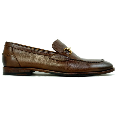 Side profile of brown bit loafer showing antique gold hardware and pebble grain texture