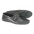 Sole view of black driving loafer showing flexible rubber driving sole