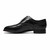 Side profile of the Florsheim Lexington black leather wingtip oxford showing full brogue detailing