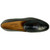 Top-down view of the Primo loafer's clean silhouette and calfskin grain in black