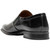Side profile of the Stacy Adams Alistair Plain Toe Ornament Slip-On in Black showing the vamp