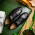 Caiman crocodile sneaker black worn on foot, Marco Di Milano Kratos view 1
