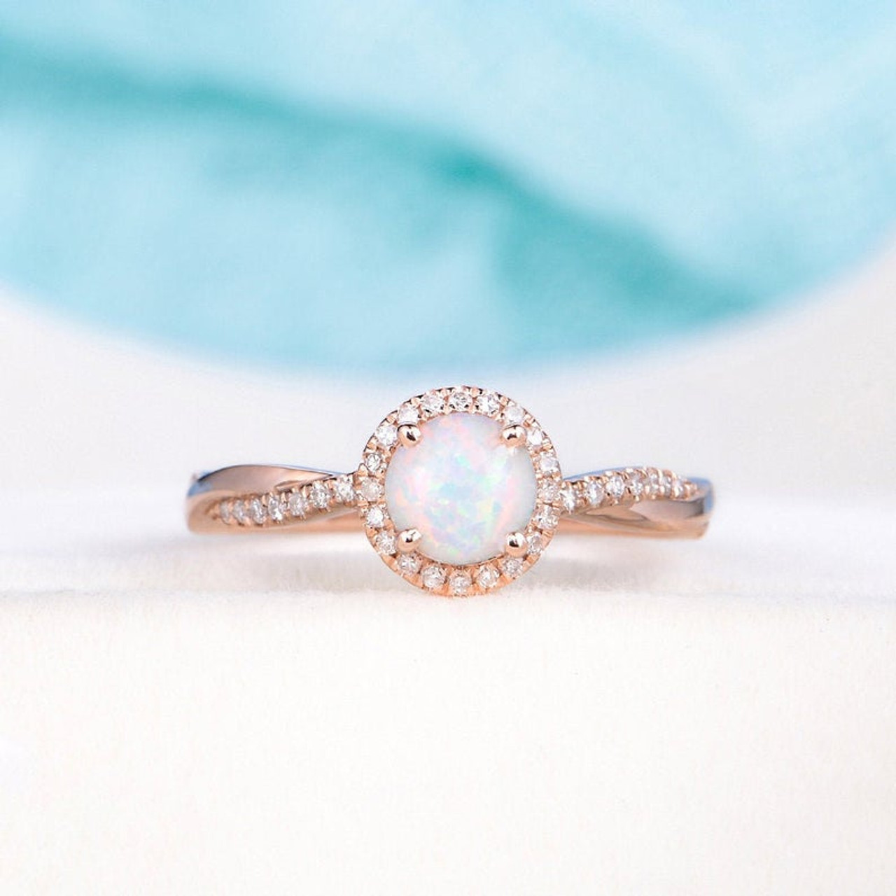 rose gold opal and diamond ring