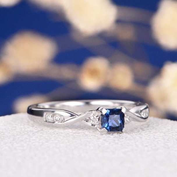 Princess Cut Blue Sapphire Micro Pave Diamond Twist Anniversary Ring