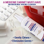 TriDerma antiseptic wound spray on table with first aid supplies – essential for home care and wound management kits