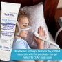 Applying TriDerma nasal gel to dry skin around nose – non-greasy, clear formula for soothing cracked skin from colds and allergies