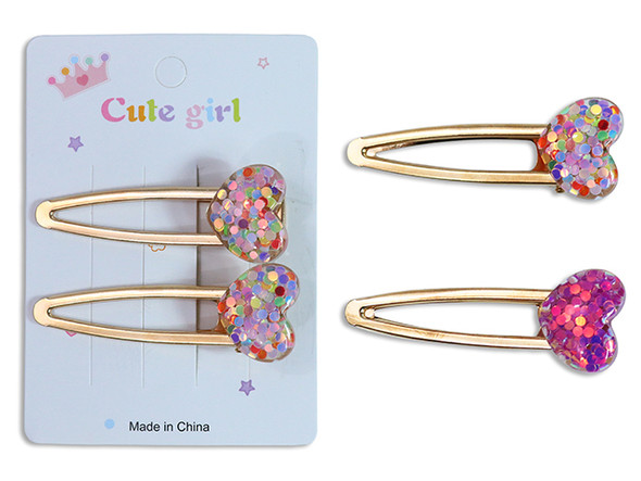 2pk Sequin Resin Heart Hair Clips. 2 Asst.Colours. Polybag w/Insert.