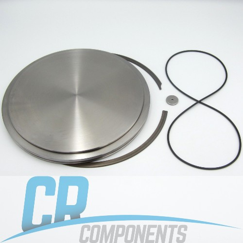 Torque Hub Drive Motor End Cover Kit for Manitou 2150RT Track Loaders. Includes the End Cover, Snap Ring, Thrust Washer/Spacer, and O-Ring.