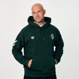Christian Vander in dunkelgrünem Hoodie