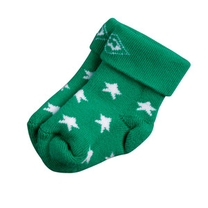 Grüne Babysocke mit weißen Sternen