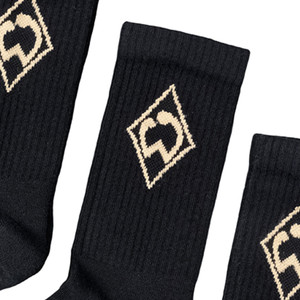 Detail eingestrickte Werder Raute in Gold