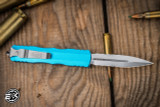 Preowned-Microtech Dirac OTF Automatic Knife Turquoise 3" Dagger Stonewash Serrated 225-11TQ