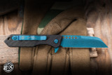 Heretic Knives Jinn Button Lock Manual Flipper Knife Black Carbon Fiber 3" MagnaCut Wharncliffe Metallic Teal H213-MT-CF