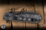 Heretic Knives Jinn Button Lock Manual Flipper Knife Marble Fat Carbon/ Glow Carbon Fiber 3" MagnaCut DLC H213-6A-MGCF