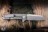 Defiant 7 Servo Folding Knife Diamond Textured Titanium 3.5" MagnaCut Stonewash