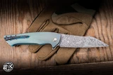 Herman Knives Ovium II Folder Knife Blue/Yellow Titanium/Black Timascus Accents 4.06" Damasteel Mirror Polish 0197