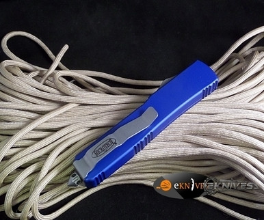 MICROTECH COMBAT TROODON BLUE D/E BLACK SERRATED 142-3BL