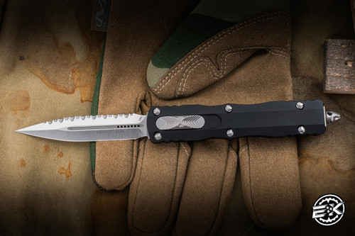 Microtech Dirac OTF Automatic Knife Black Hefted Alloy 2.8\" M390 Dagger Full Serrated Satin 225-6