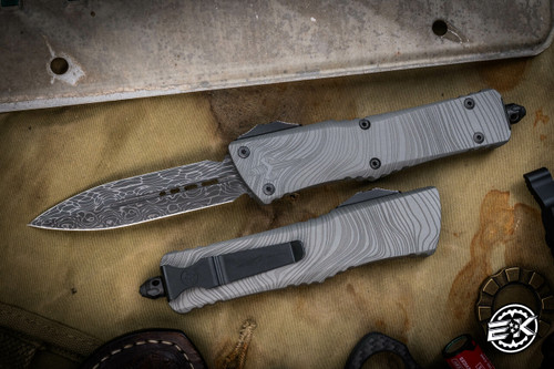 Microtech Combat Troodon Beskar OTF Automatic Knife 3.8" Damascus Dagger 142-16DLCBES