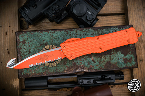 Preowned-Microtech Combat Troodon Rescue OTF Knife Orange Frag 3.8" Orange Serrated 601-3CORHS