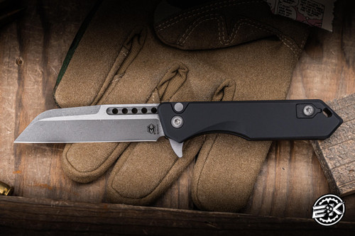 Heretic Knives Jinn Button Lock Flipper Knife Black Aluminum 3" MagnaCut Wharncliffe Battleworn H213-5A