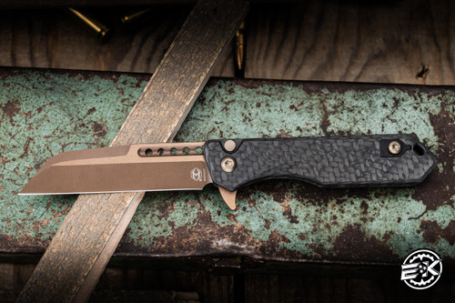 Heretic Knives Jinn Button Lock Flipper Black Carbon Fiber 3" MagnaCut Wharncliffe Bronze H213-7A-CF