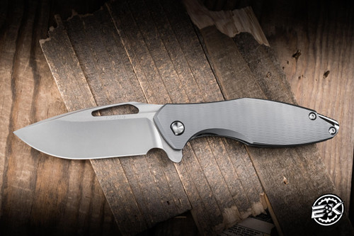 Koenig Knives Arius Flipper Knife Plexa Titanium 3.5" M390 Drop Point Burnished Polished Flats
